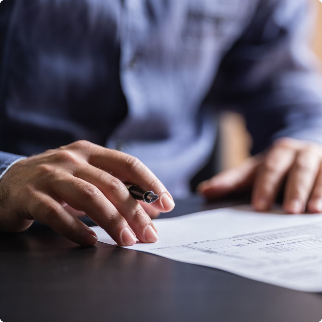 Man reading Ignitis ON contract